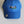 Royal Blue Lazy Dog Brand Performance Hat with black and white border collie and green "Lazy Dog" lettering embroidered in center of hat. Hat is nylon with black underbill and sweatband. Hat offers UPF 50+ sun protection
