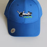 Royal Blue Lazy Dog Brand Performance Hat with black and white border collie and green "Lazy Dog" lettering embroidered in center of hat. Hat is nylon with black underbill and sweatband. Hat offers UPF 50+ sun protection