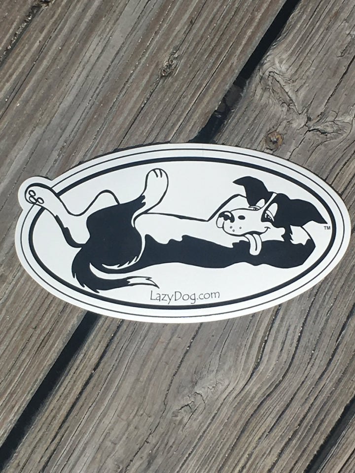 Black and white Lazy Dog oval decal sticker of lounging back dog.